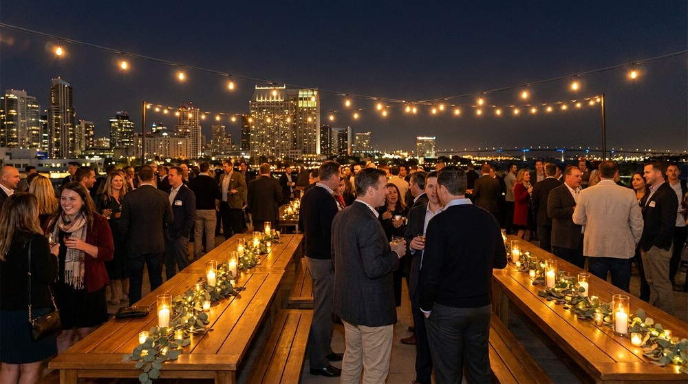 Corporate holiday party on a rooftop event venue in downtown San Diego at night