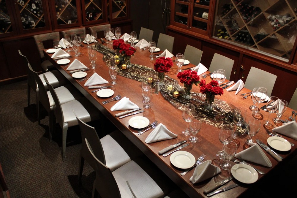 Elegant private dining room set for a corporate dinner event in San Diego